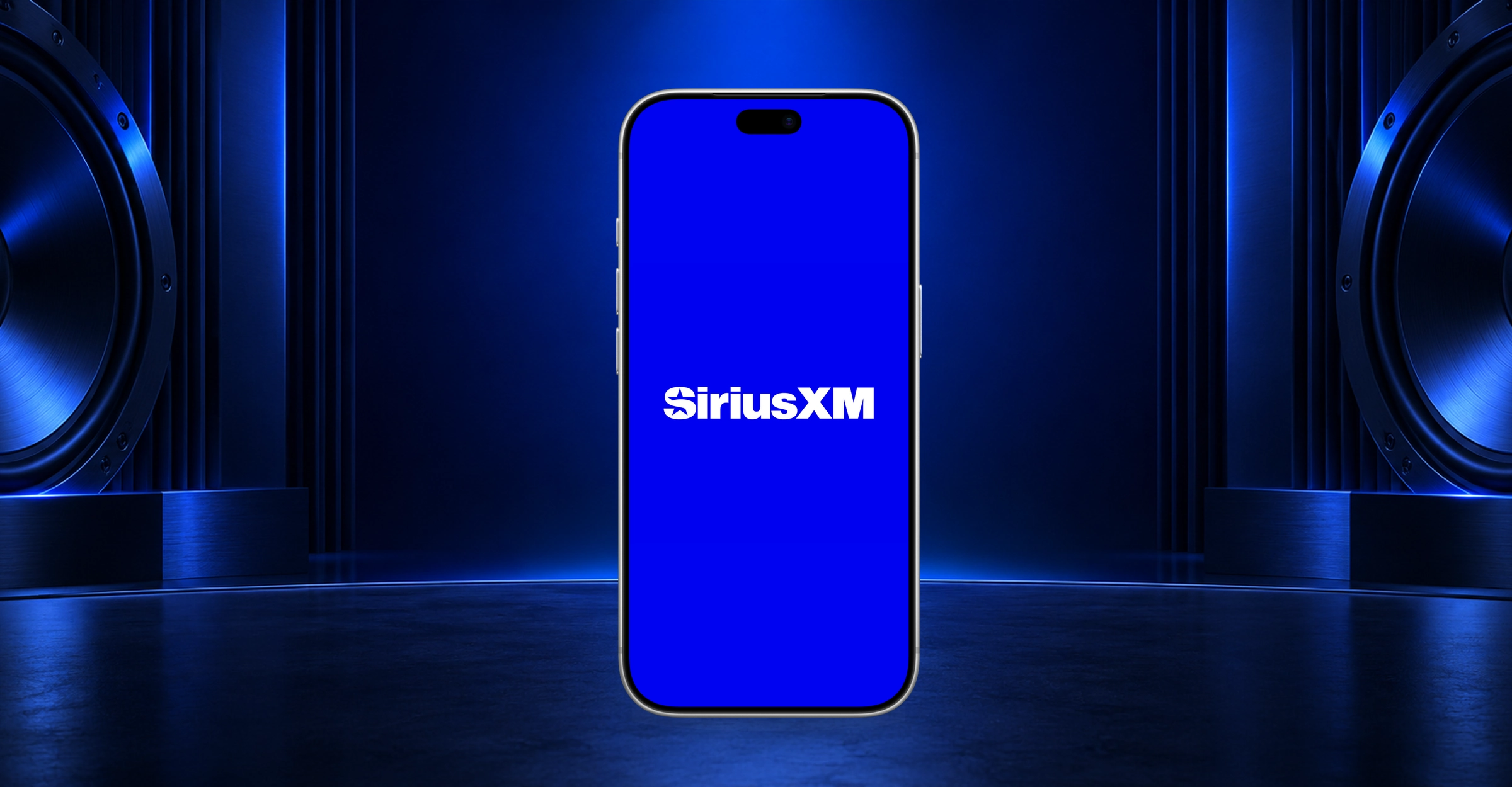 The SiriusXM logo on an iPhone surrounded by a cobalt blue listening studio